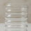 Nahaufnahme der transparenten Bubble Vase mit abgerundeten Glasringen und glänzender Oberfläche.