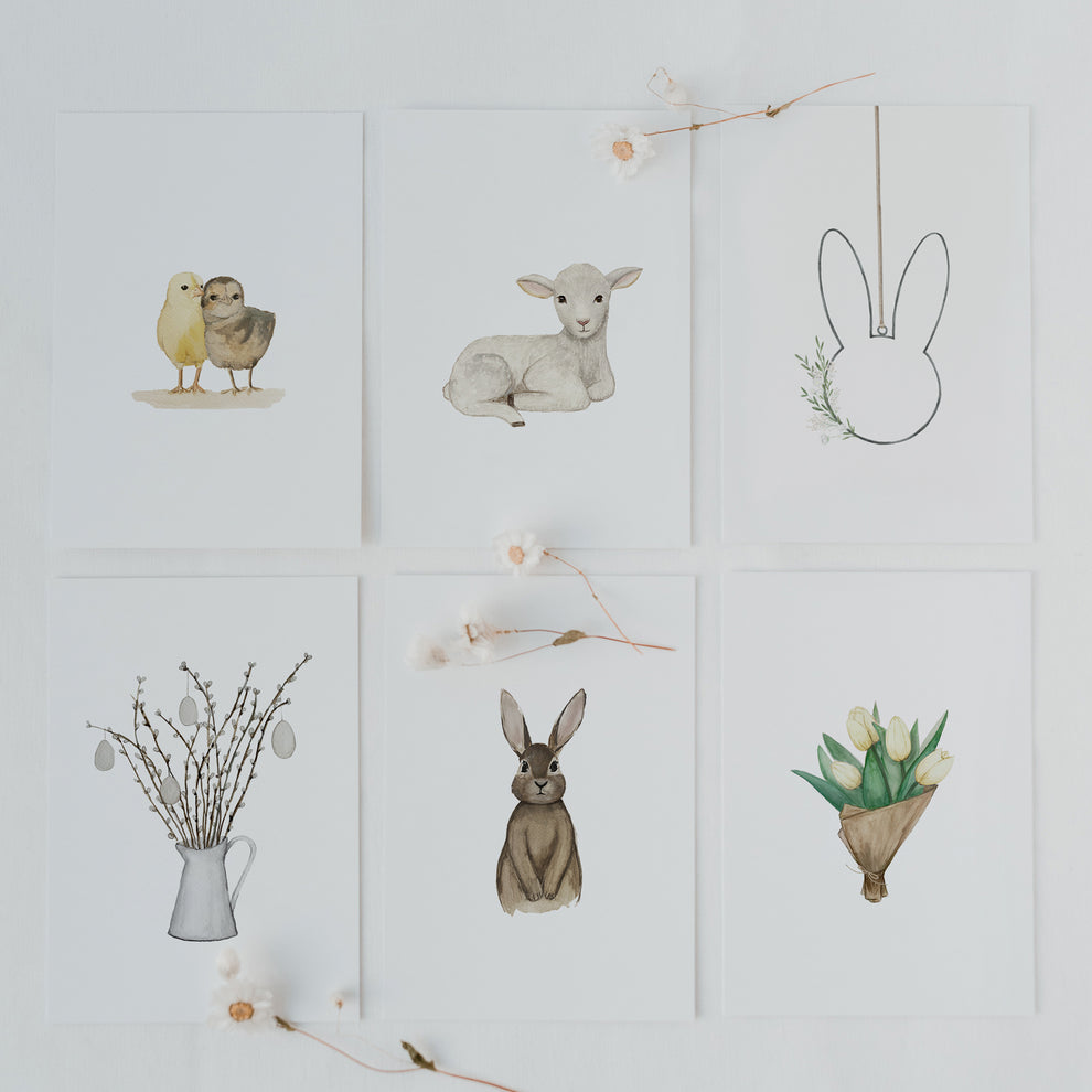 Aquarell-Kartenset Ostern mit sechs Motiven, liebevoll arrangiert: Küken, Lamm, Hase, Tulpenstrauß und Weidenzweige.